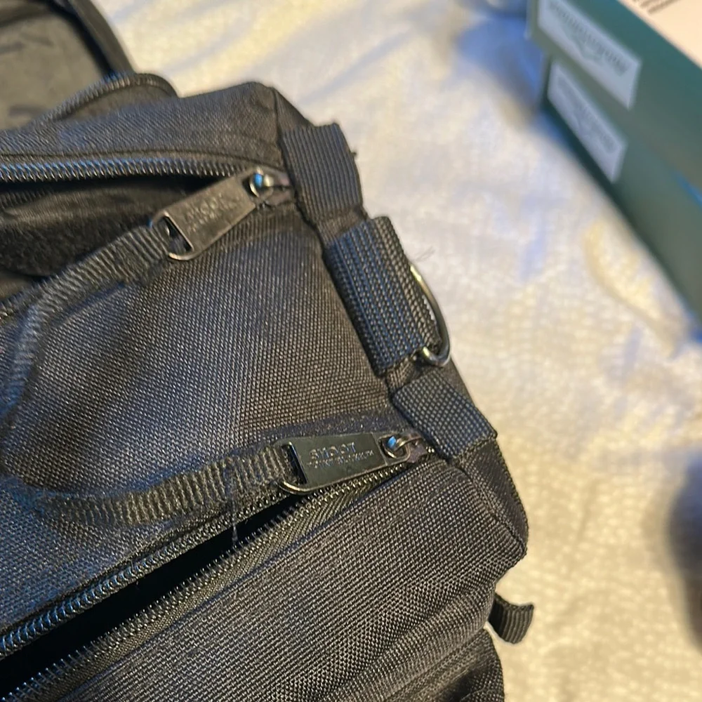 Black Duffel Bag with Rigid Structure and Durable Fabric